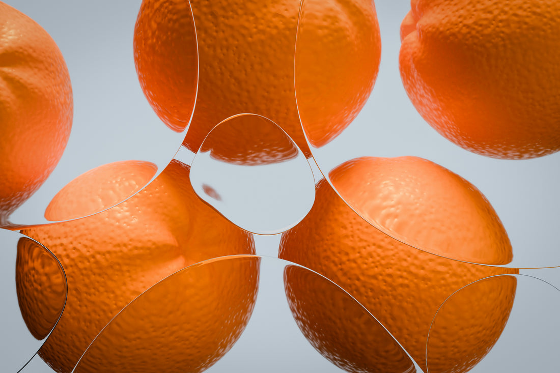 Des oranges sous des bulles d'eau claire